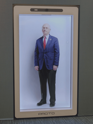 Dr. Jeffrey Gold's AI avatar in a holographic box