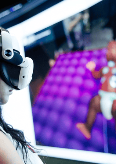 person wearing head-mounted display with view of virtual baby in the background